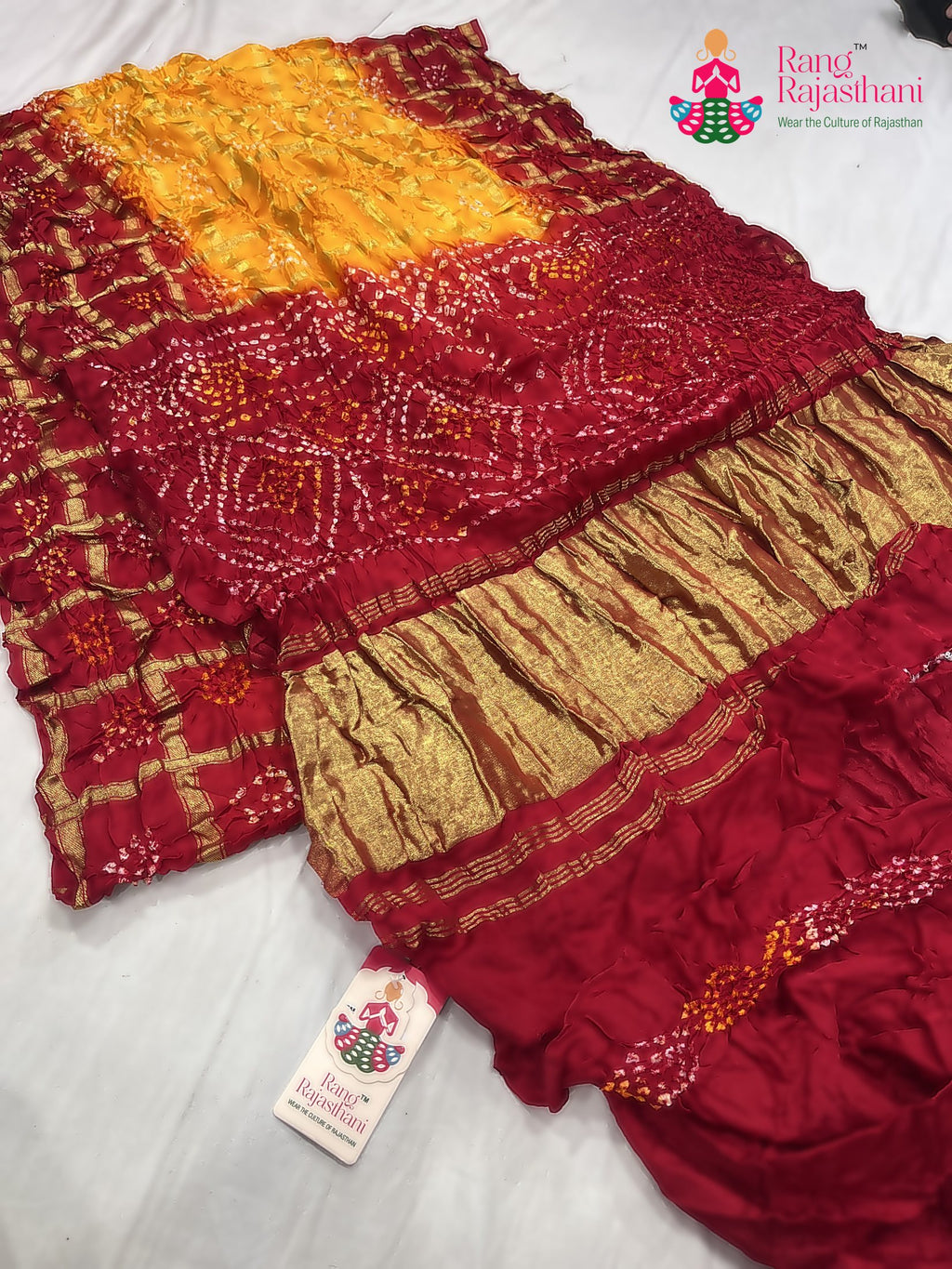 complete look of yellow russian silk bandhani gharchola saree 