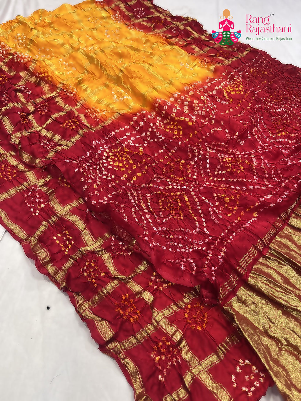 yellow russian silk bandhani gharchola saree for motherhood ceremony by Rang Rajasthani
