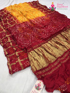 close up detailing of yellow russian silk bandhani gharchola saree 