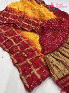 pallu detailing of yellow russian silk bandhani gharchola saree 