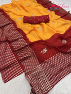 close up detailing of yellow russian silk hand embellishment pila saree 