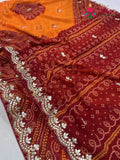 close up detailing of yellow saree 