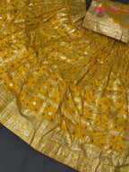 yellow silk bandhani saree ethnic wear by Rang Rajasthani
