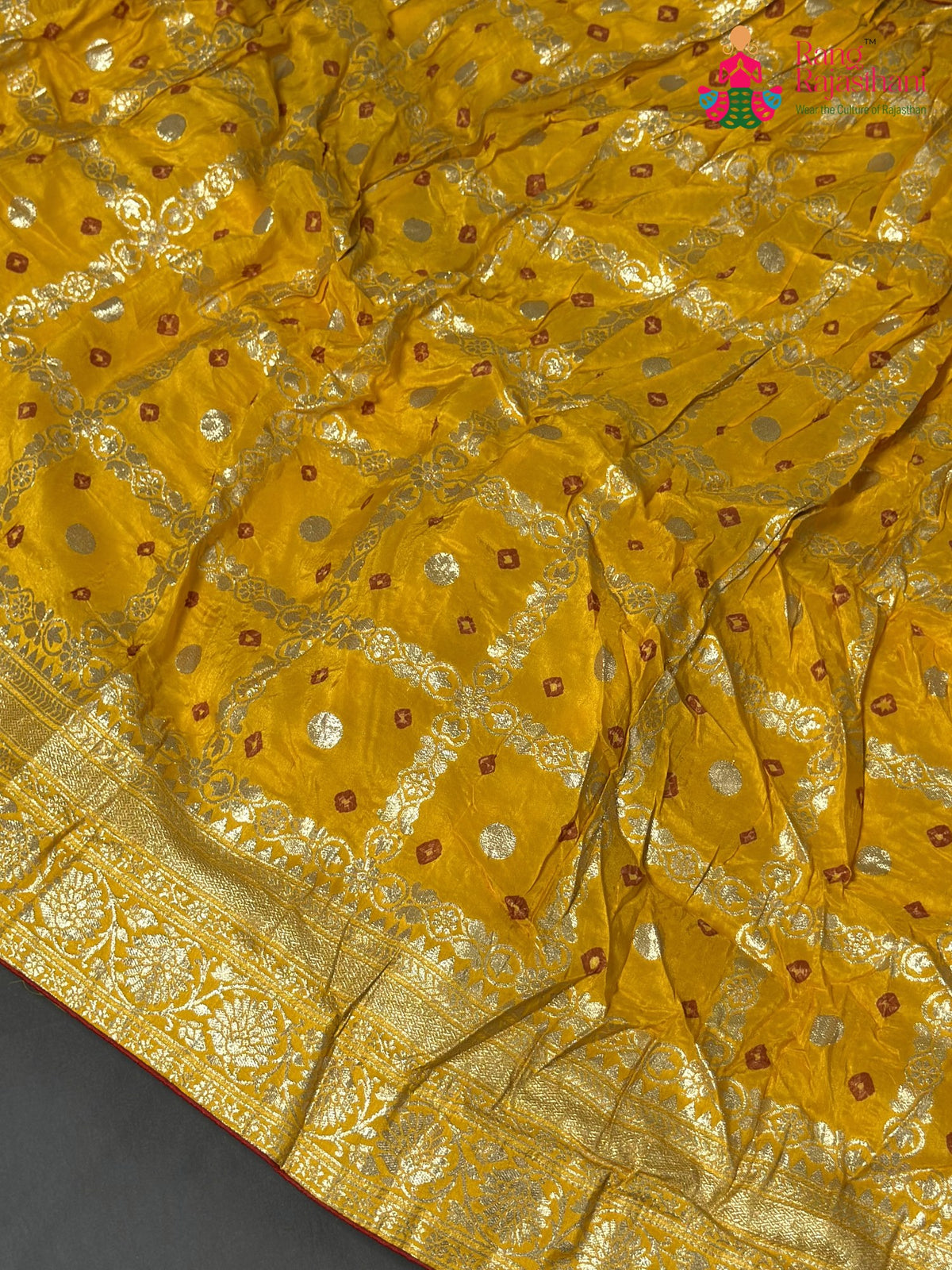 lehenga flare detailing of yellow silk bandhani saree