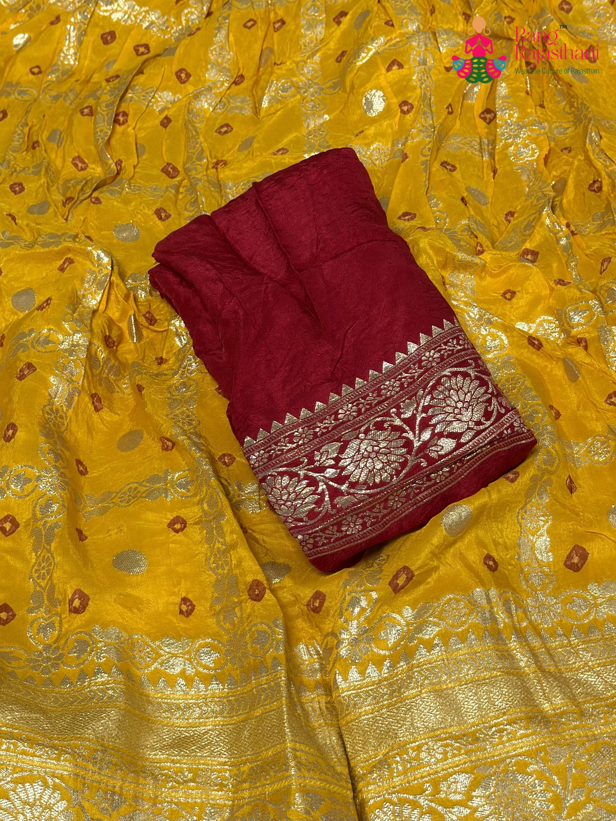 close up view of yellow silk bandhani saree