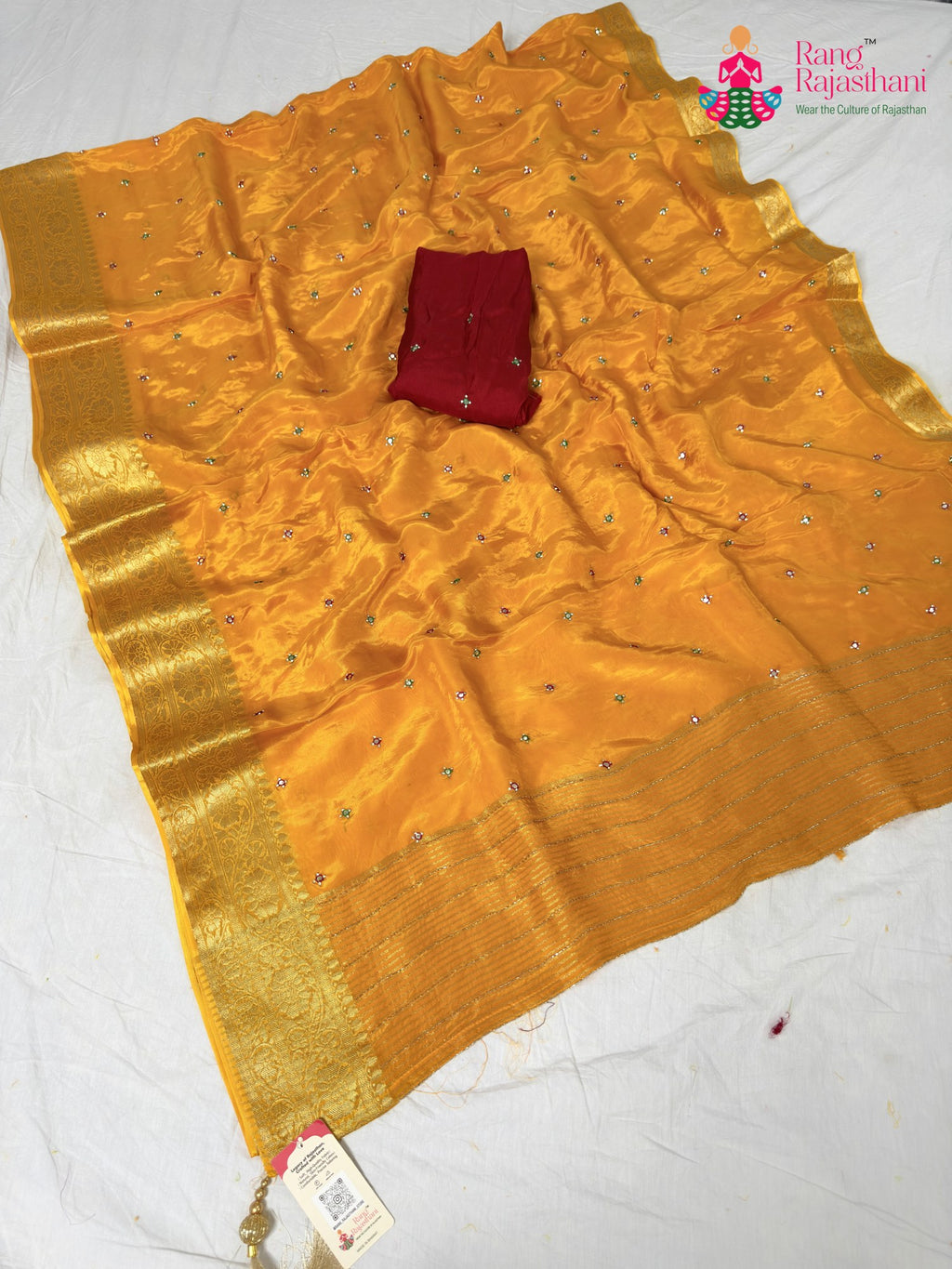 border detailing of yellow silk saree