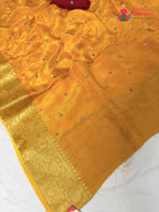 fabric texture of yellow silk saree