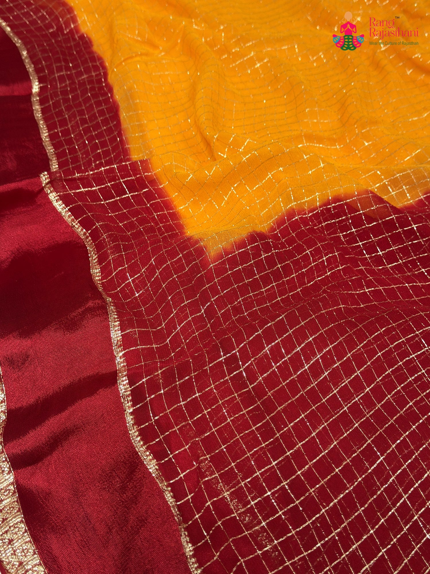 border detail of yellow soft georgette banarasi zari weave saree