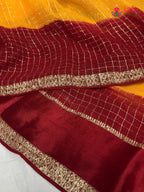 design pattern of yellow soft georgette banarasi zari weave saree