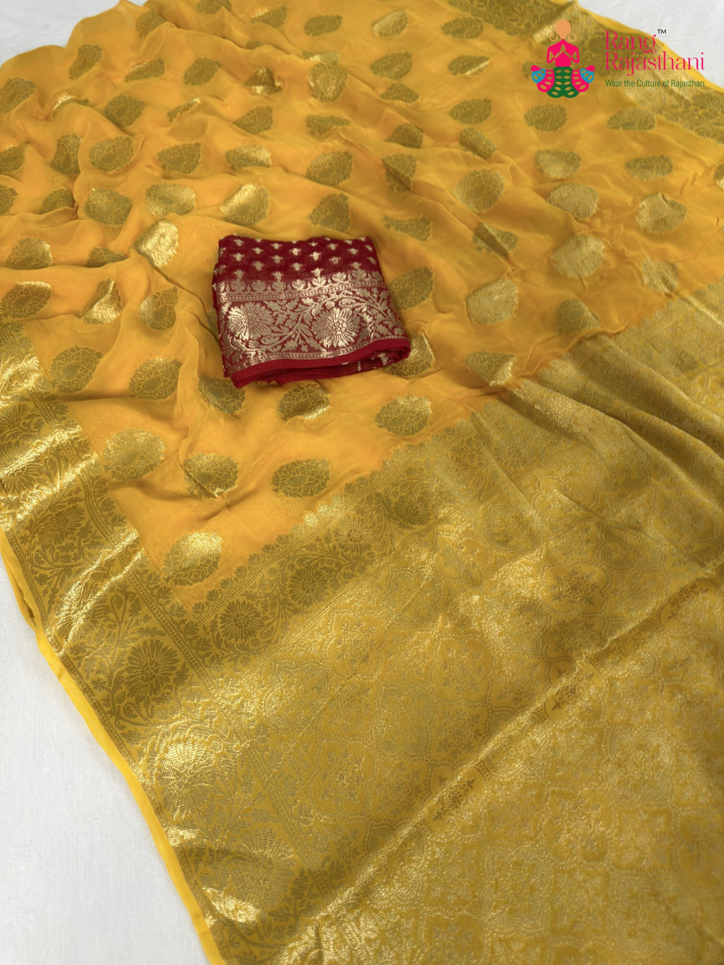 pallu detailing of yellow soft georgette banarasi zari weave saree