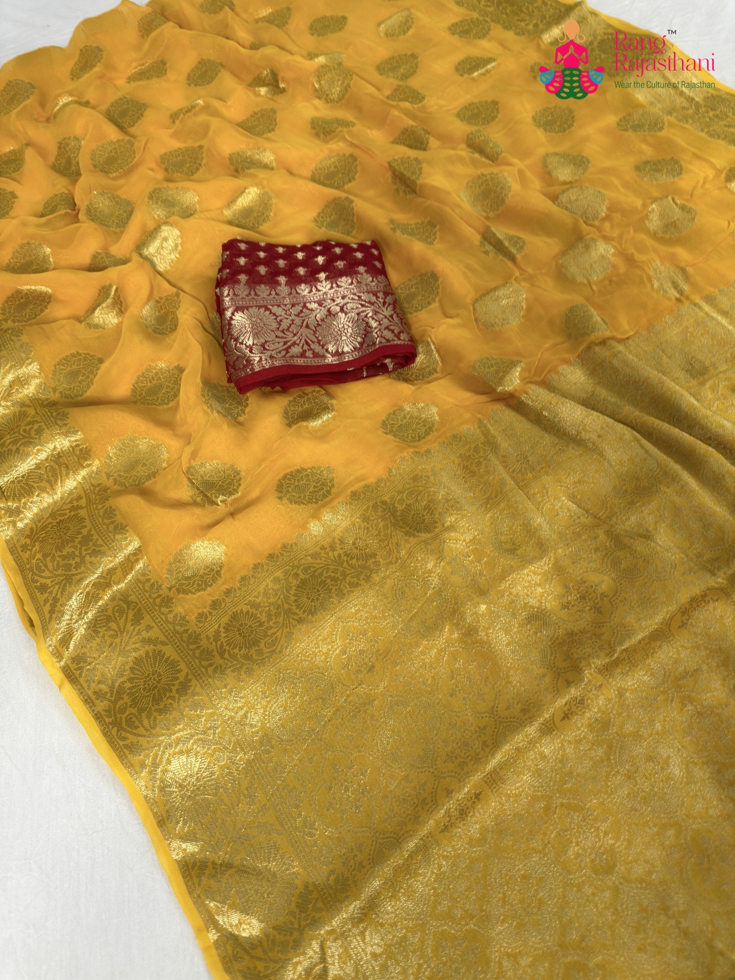 pallu detailing of yellow soft georgette banarasi zari weave saree
