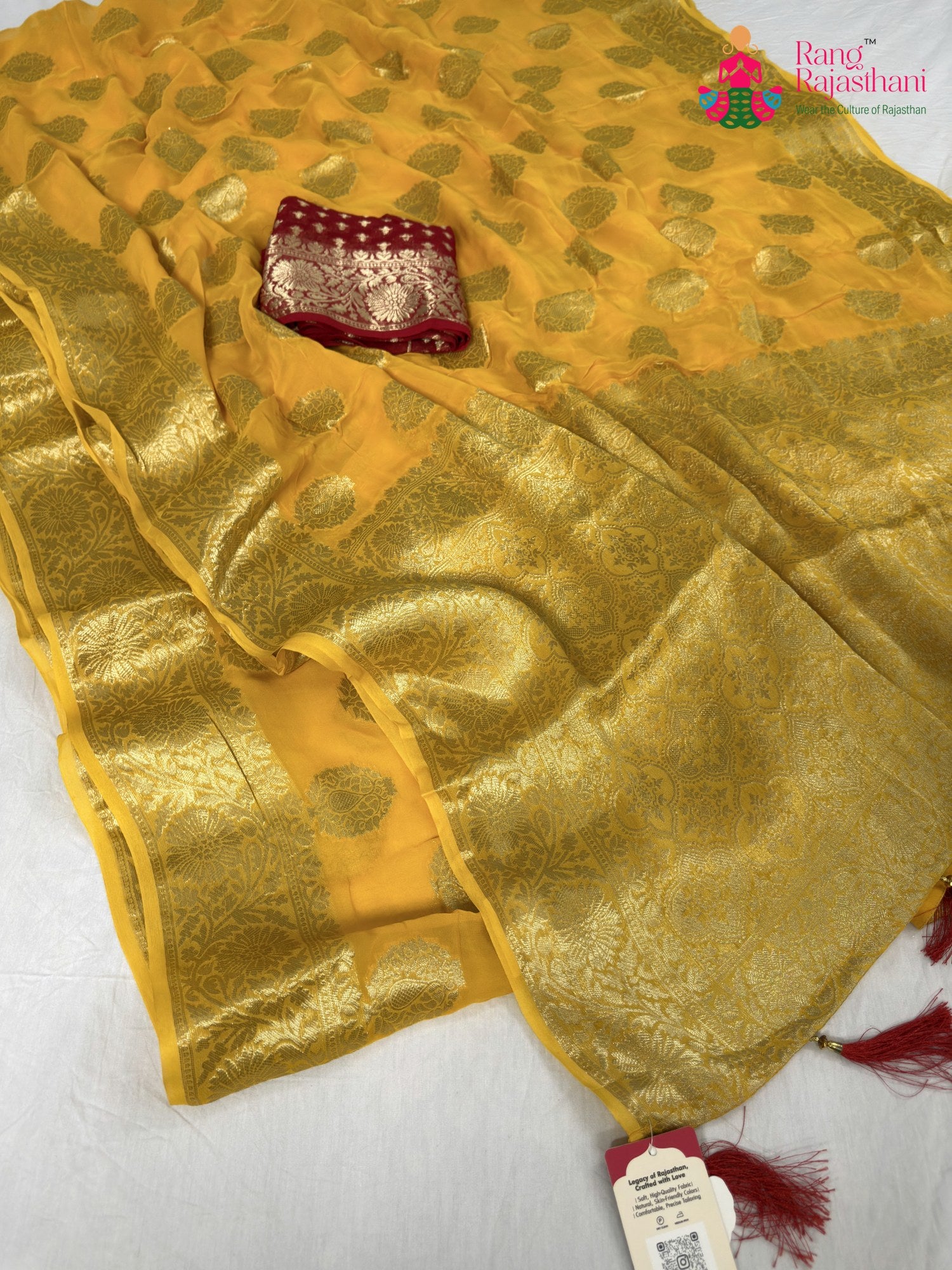 close up detailing of yellow soft georgette banarasi zari weave saree