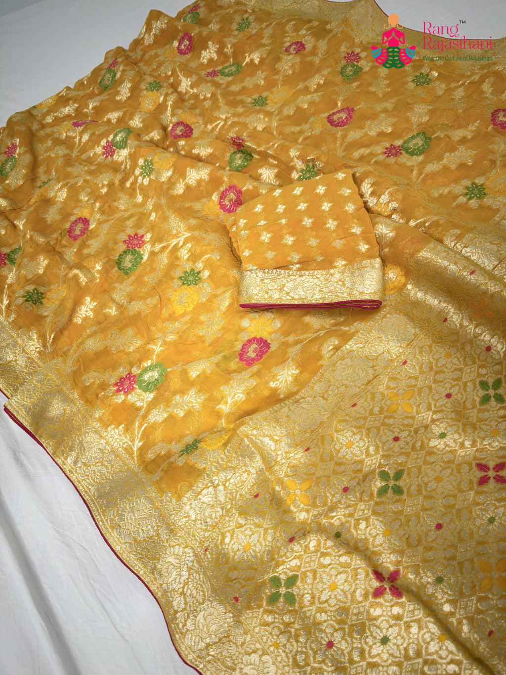 pallu detailing of yellow soft georgette meenakari zari saree