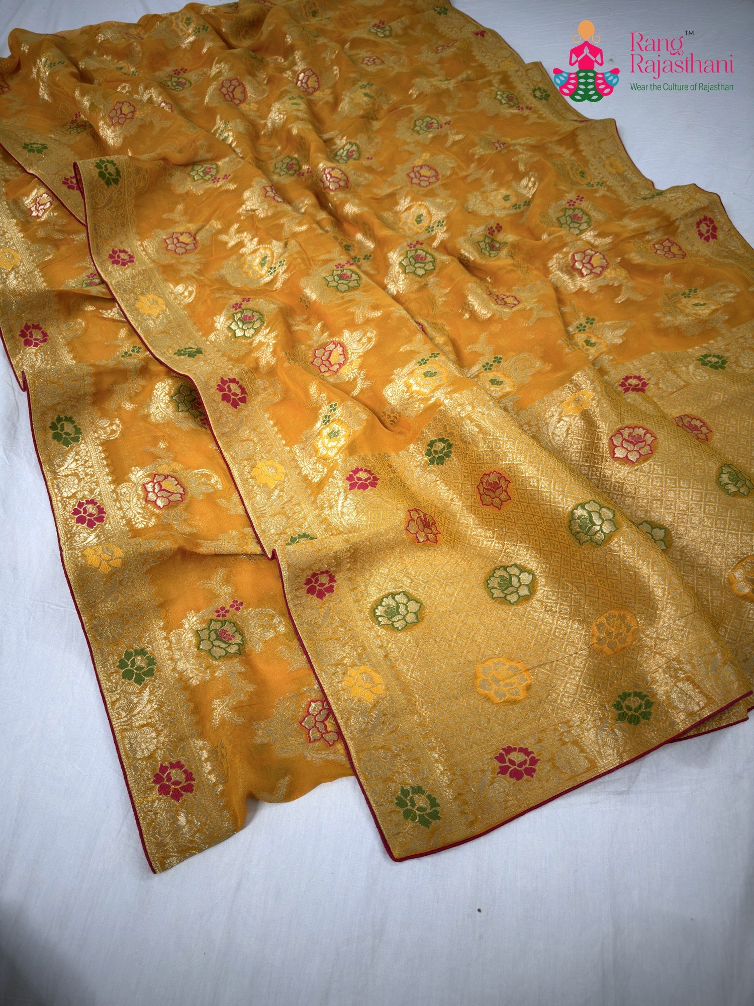 complete look of yellow soft georgette meenakari zari saree