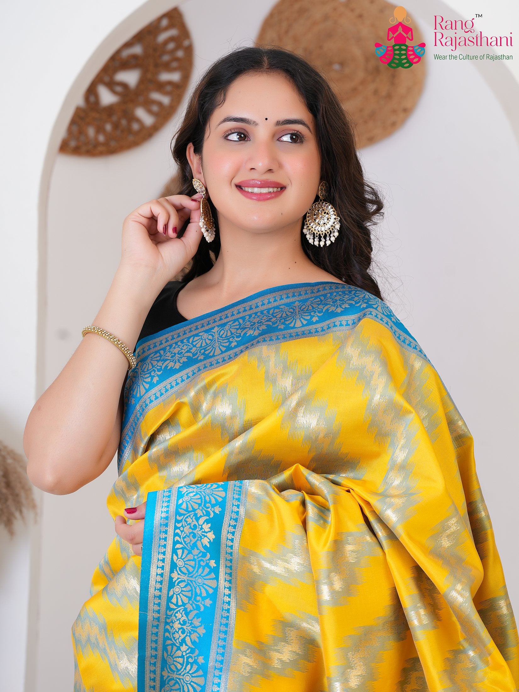 Yellow SyntheticSilk saree with BanarasiZari close up detailing