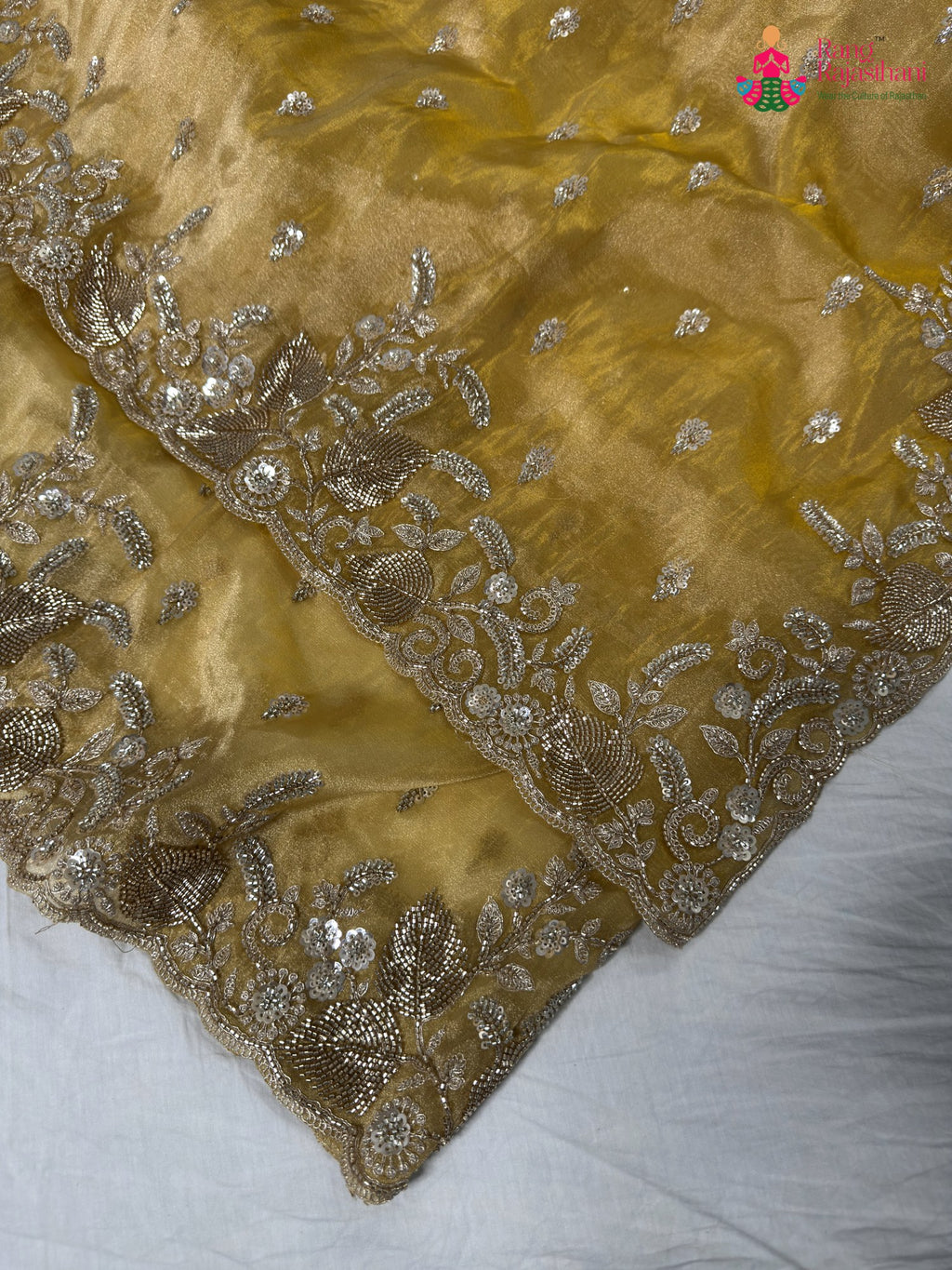 border detailing of yellow synthetic hand embellishment saree