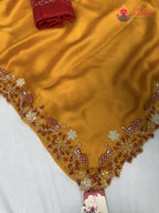 pallu detailing of yellow synthetic zari embroidery saree