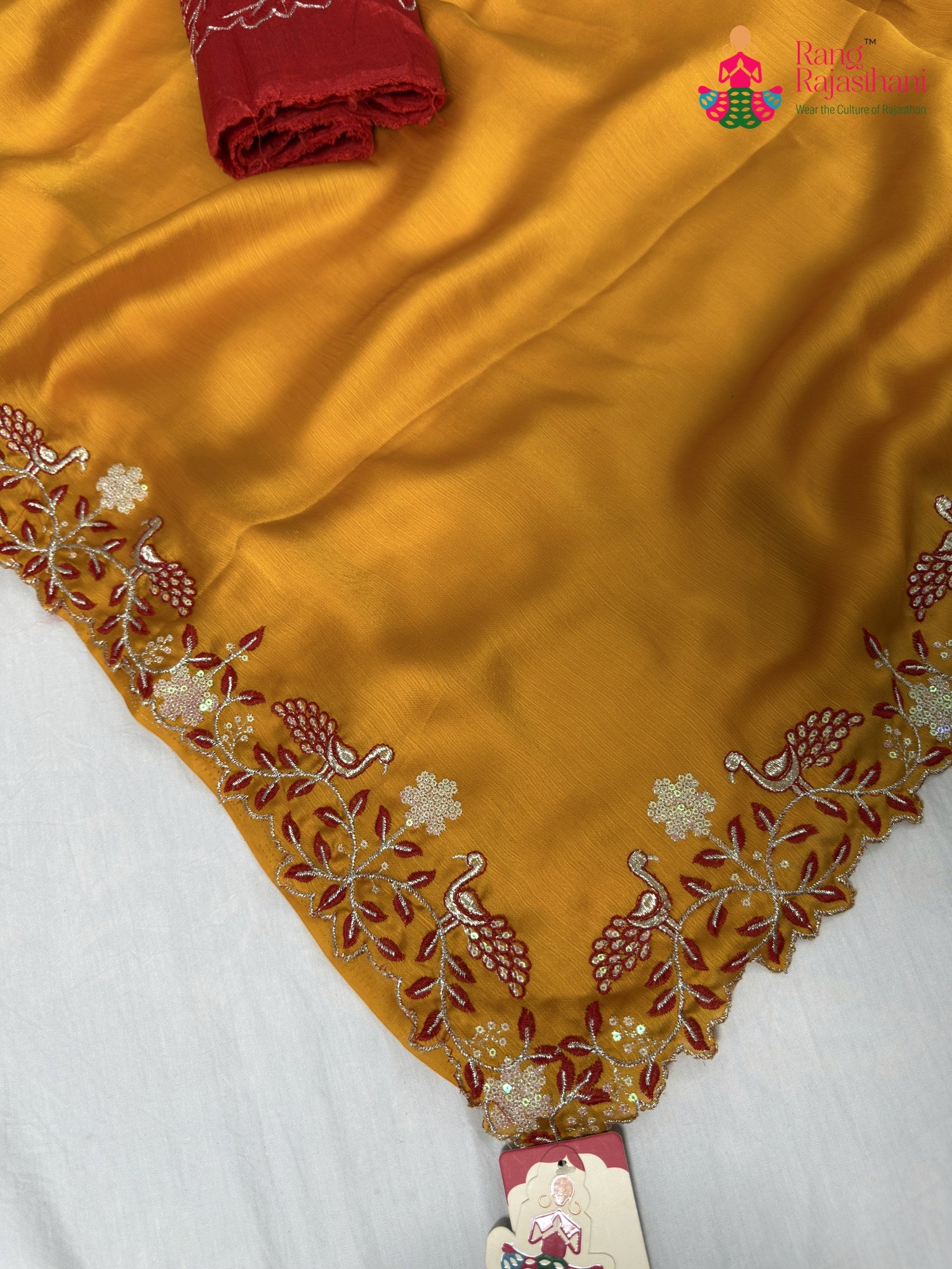 pallu detailing of yellow synthetic zari embroidery saree