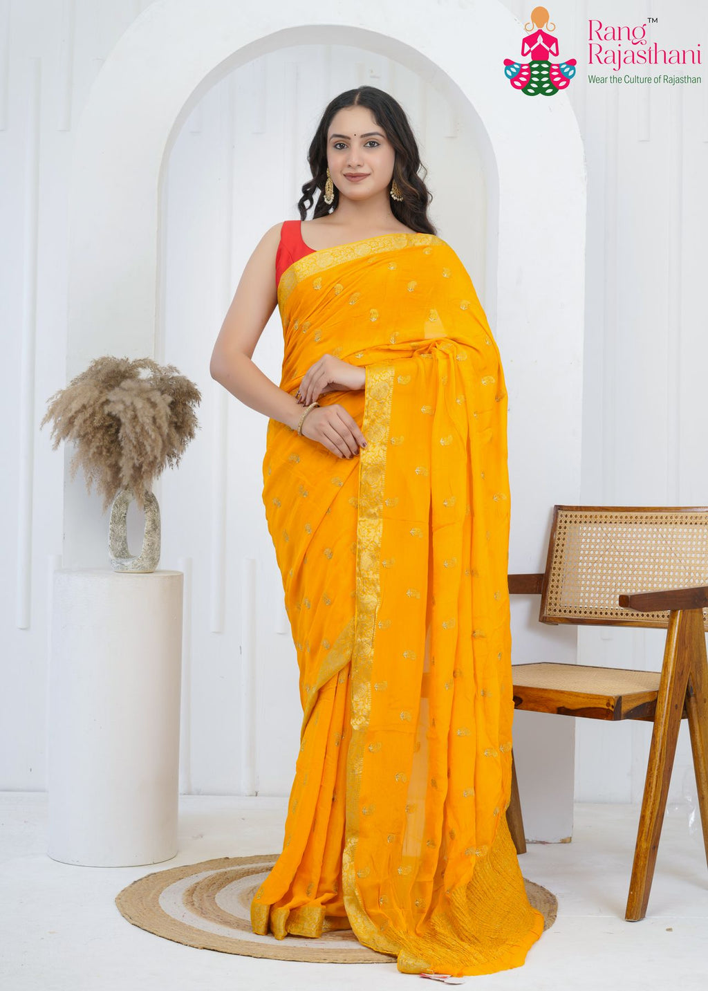 yellow chinnon saree with hand-embroidered buttis amp; banarasi zari border