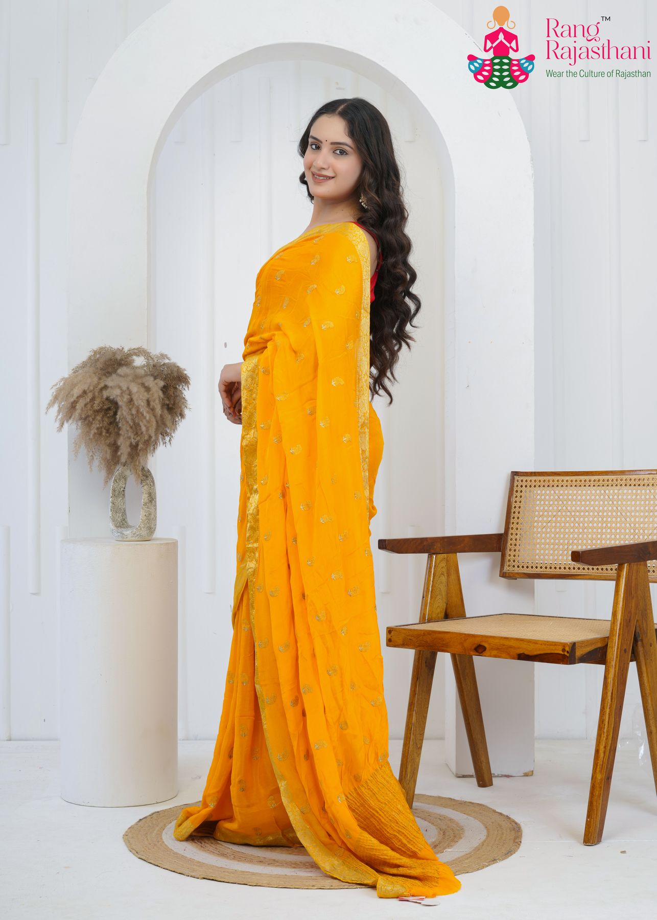 yellow chinnon saree with hand-embroidered buttis amp; banarasi zari side drape view