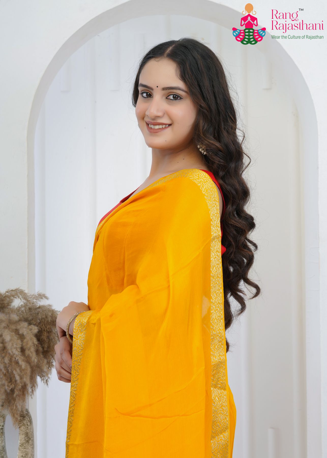 yellow pure chinnon saree with zari work for mangal path close-up view