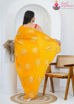 Yellow Chinon saree with Hand-Work back view