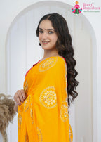 Yellow Chinon saree with Hand-Work close up detailing