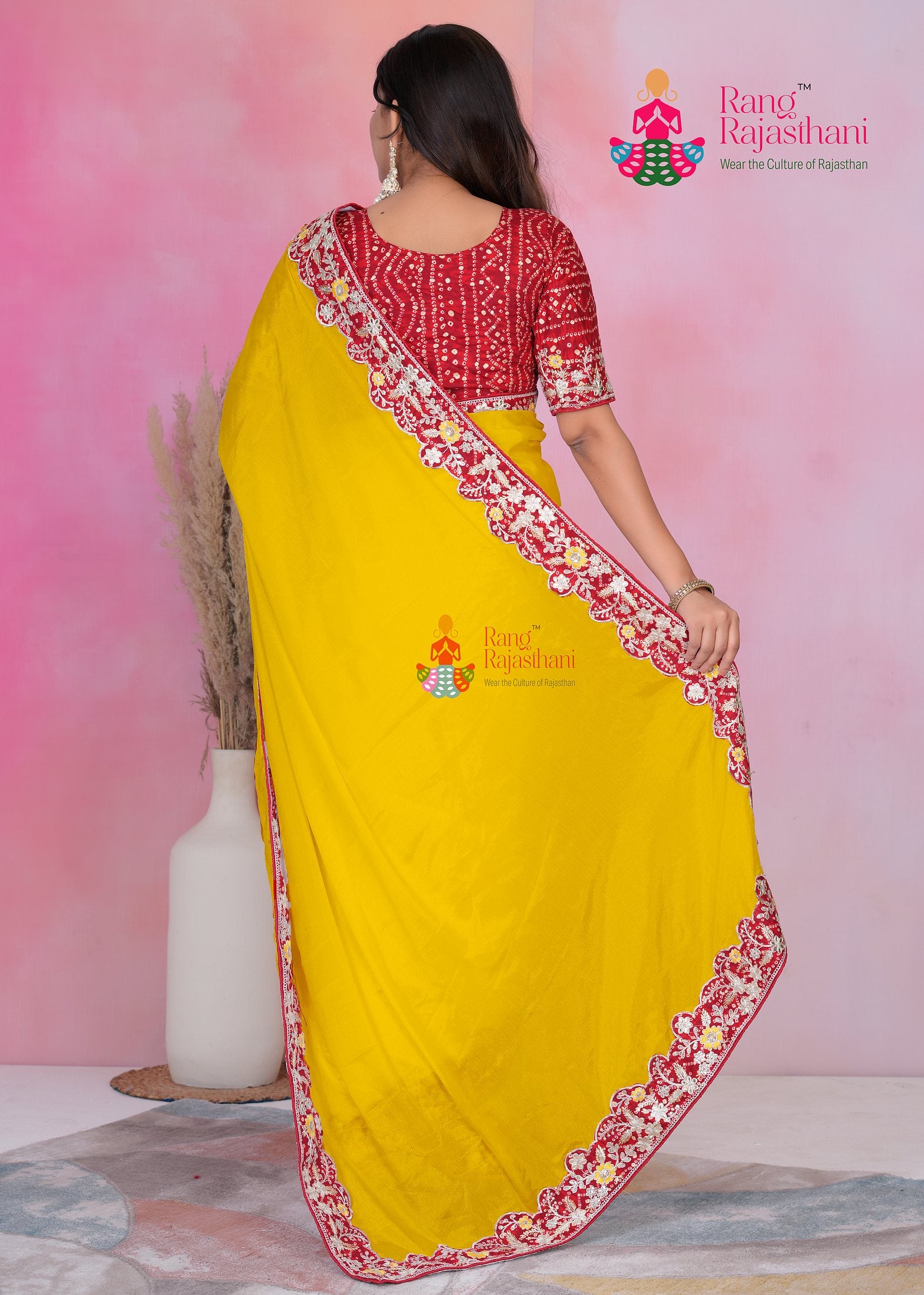 close up detailing of yellowg fabric saree 